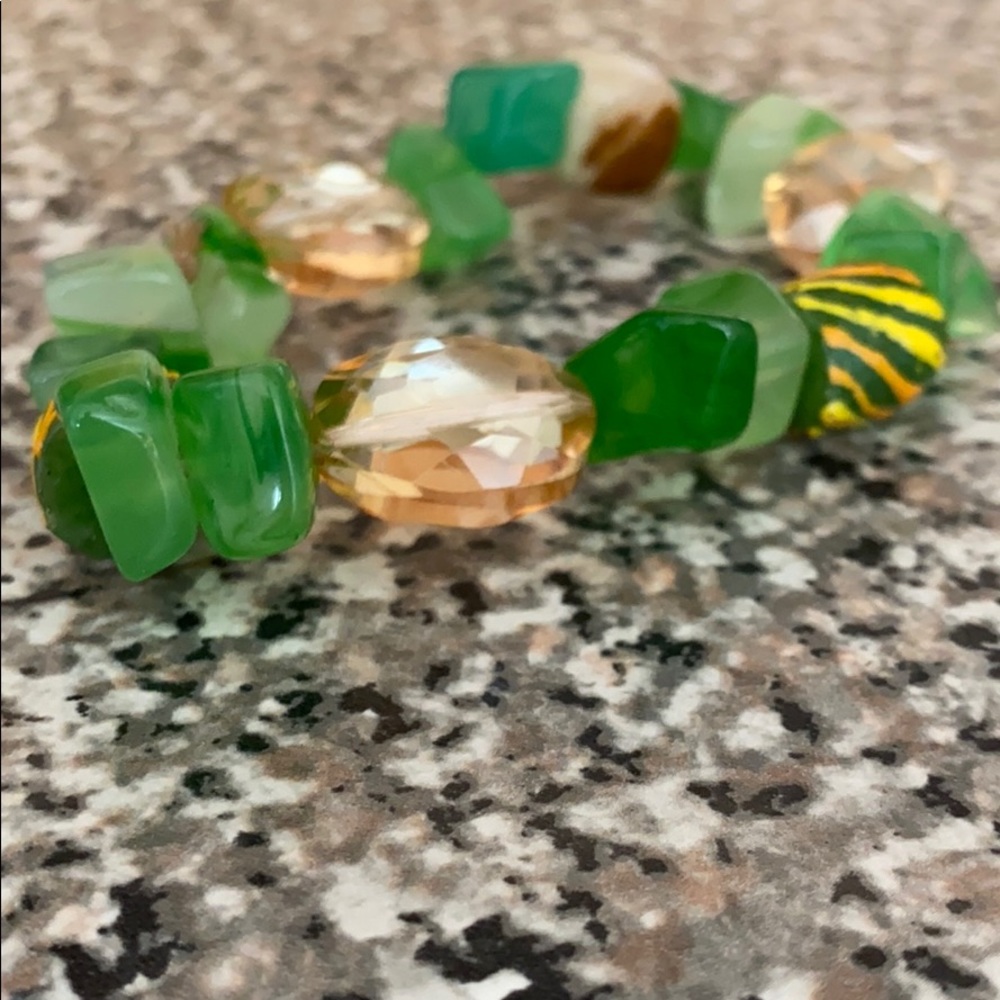 A bracelet with stones on them